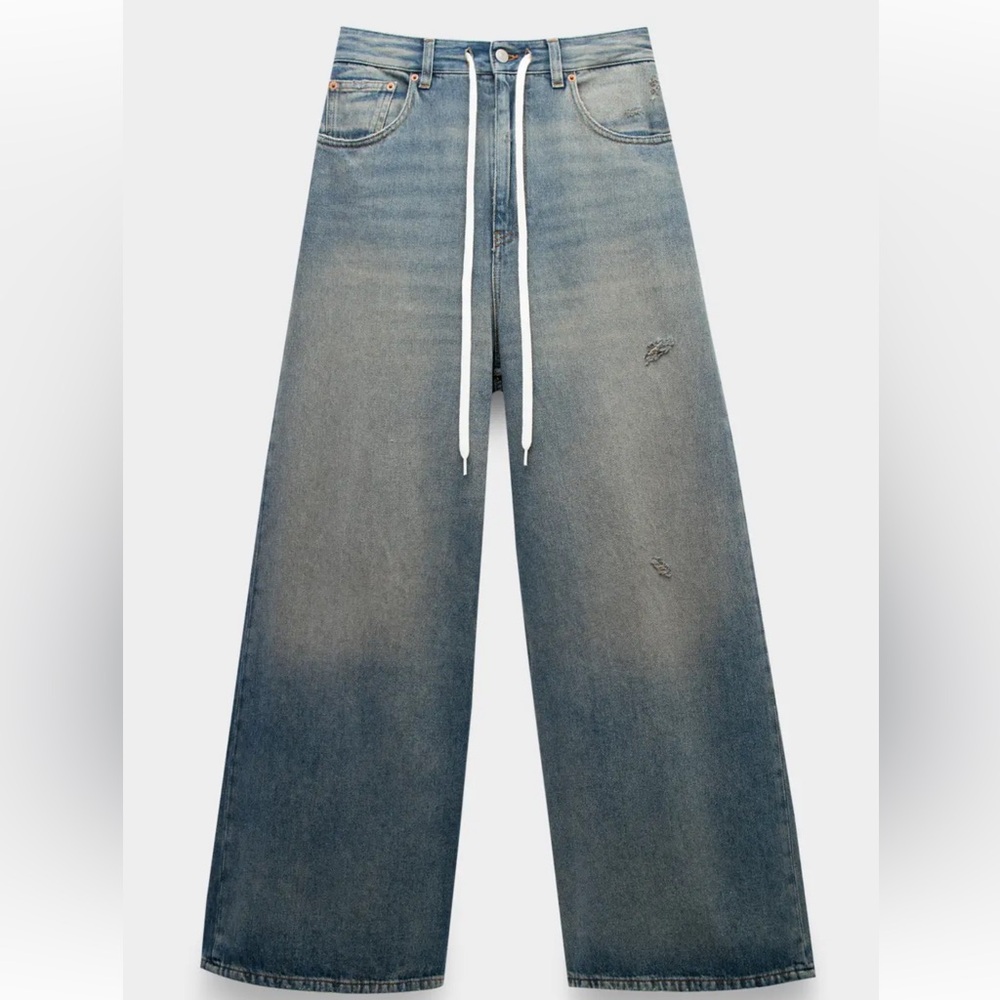 MM6 Maison Margiela

Wide-leg jeans with a drawstring waist